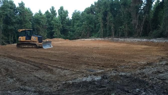 Bulldozer on a graded site